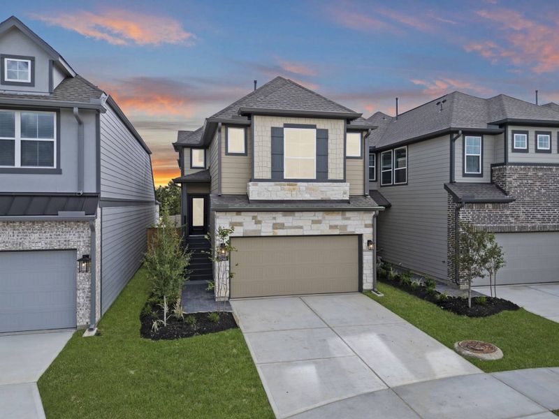 Front exterior of a new home in Bridgeland, Cypress, TX, highlighting curb appeal (Image 19).