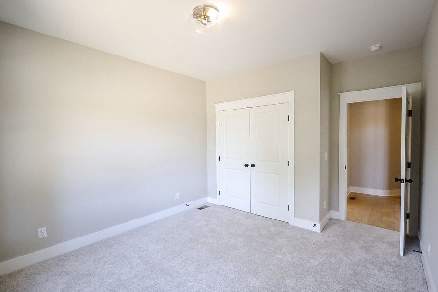 Spacious, unfurnished interior of a new home in Baker Road, Birchwood (Image 47).