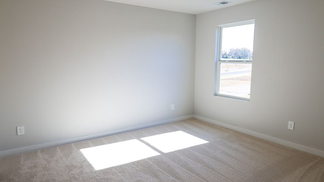 Representative unfurnished interior of a home built from the STONEBROOK II by D.R. Horton in Harvest Point, Spring Hill (Image 51).