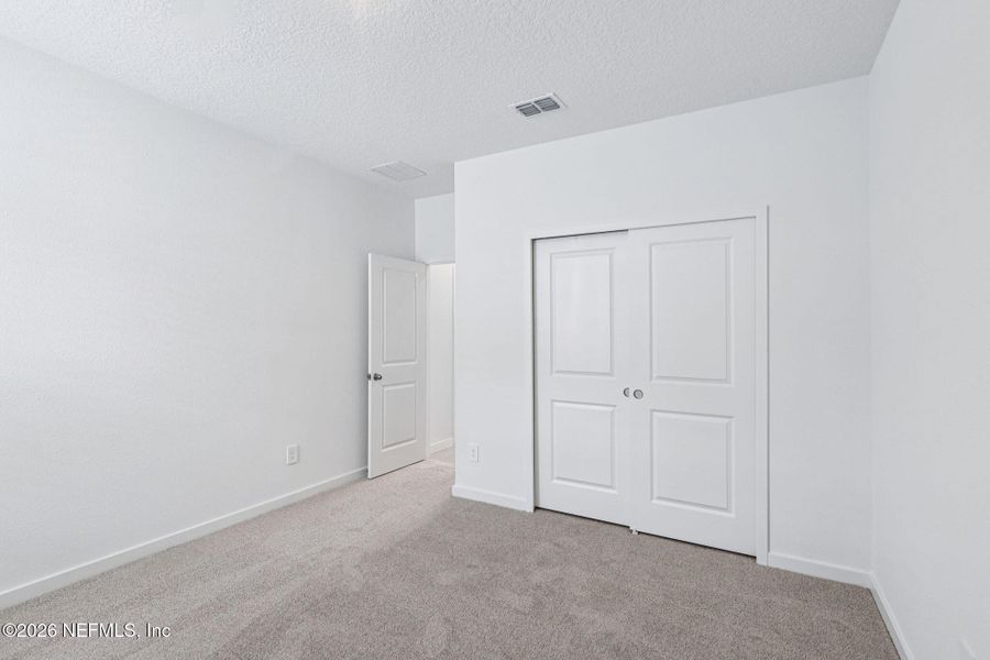 Spacious, unfurnished interior of a new home in Flagler Village - Signature Series, Palm Coast (Image 19).