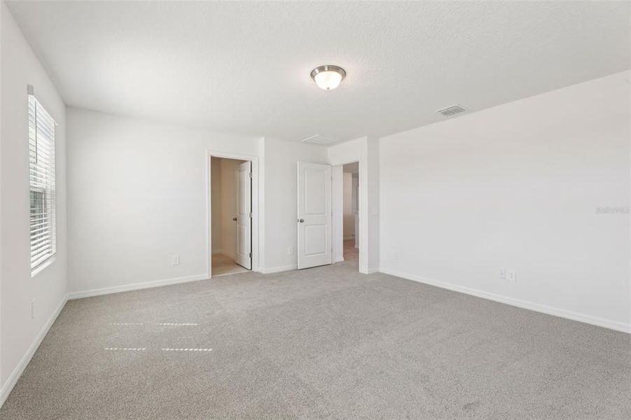 Spacious, unfurnished interior of a new home in Crosswinds - Signature Series, Haines City (Image 28).