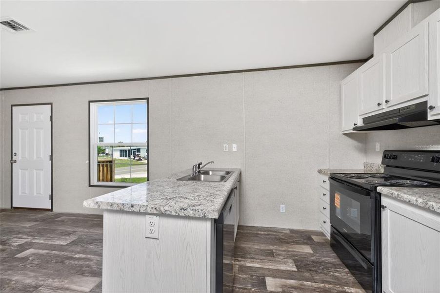 Furnished interior view inside a new home in , Port Charlotte (Image 5).