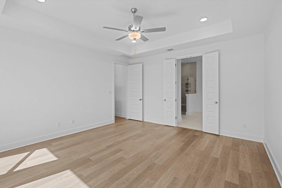 Primary Bedroom with tray ceiling