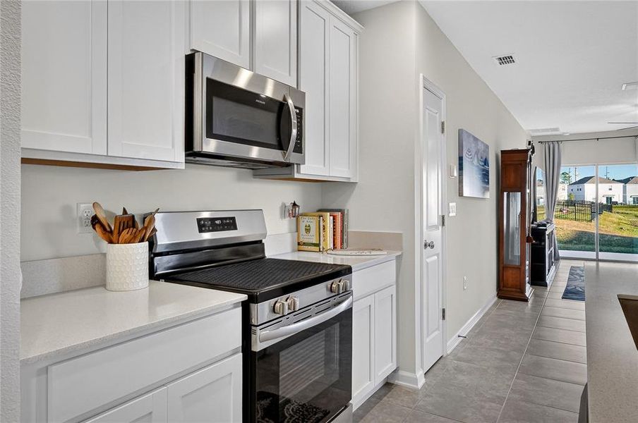 Furnished interior view inside a new home in Preserve at LPGA: Manor Collection, Daytona Beach (Image 8).