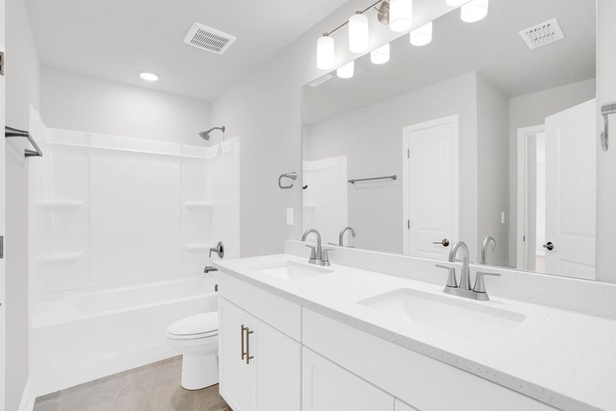 Furnished interior view inside a new home in Carriage Estates, Lexington (Image 11).
