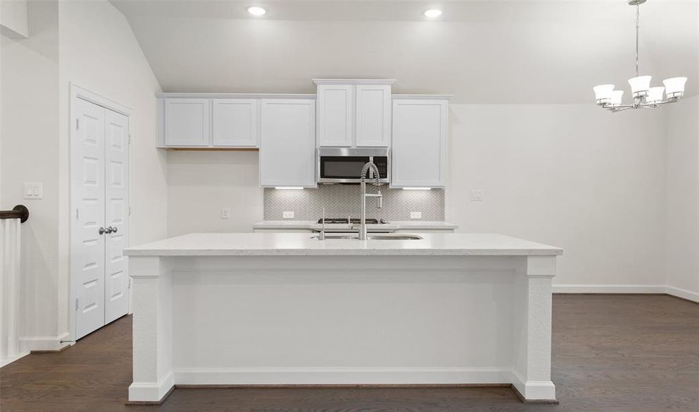 Lovely kitchen layout with dining area (*Photo not of actual home and used for illustration purposes only.)