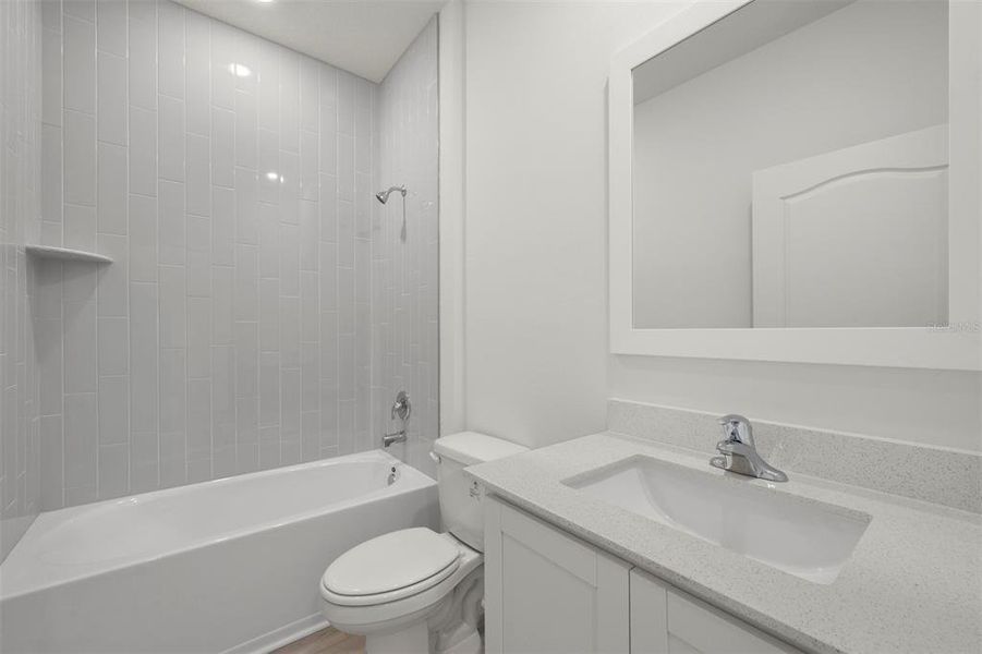 Furnished interior view inside a new home in Peach Crossings, Winter Haven (Image 12).