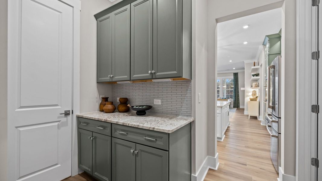 The Inspire Plan by DBR Homes kitchen with butler's pantry in Fort Mill, SC.