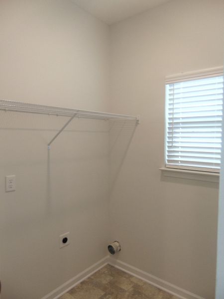 The laundry room with a rack for all your laundry detergents The laundry room with a rack for all your laundry detergents