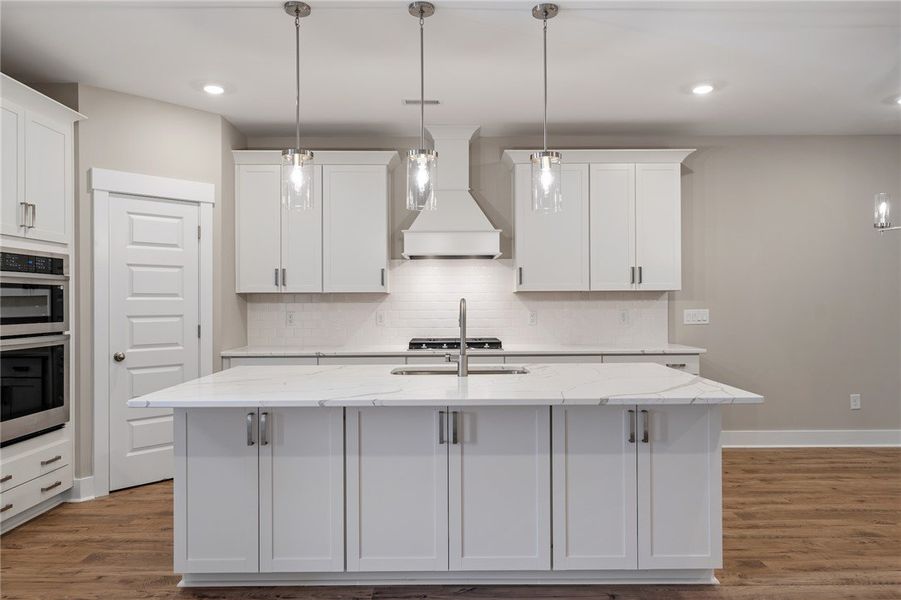 A well-appointed kitchen features a generously siz