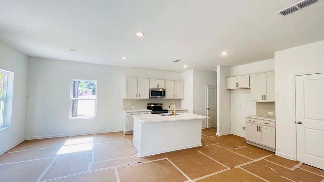 Kitchen featuring Serene Collection Finishes Construction Progress