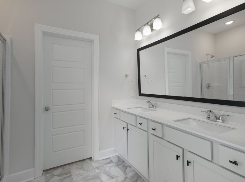 Representative furnished interior of a home built from the The Ivory by Cothran Homes in Holly Ridge, Greenville (Image 13).