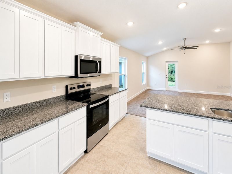 Furnished interior view inside a new home in Harmony Central, St. Cloud (Image 7).