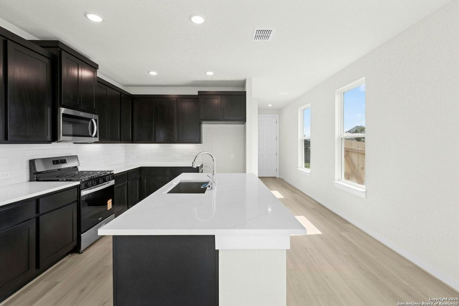 Furnished interior view inside a new home in Willowbrook, New Braunfels (Image 7). Furnished interior view inside a new home in Willowbrook, New Braunfels (Image 7).