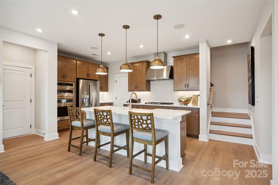 This space awaits your design selections whether it be white cabinetry or a statement backsplash, the choice is yours! *Model Photos | actual finishes, structural selections, and orientation may vary.