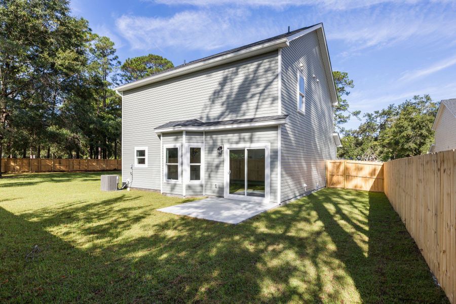 Exterior details and patio area of a home in , Johns Island (Image 19). Exterior details and patio area of a home in , Johns Island (Image 19).