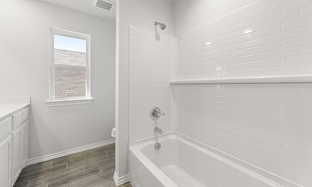 Representative exterior photo of a completed home built from the Thorndale by Impression Homes in Heartland, Heartland, TX (Image 25). Representative exterior photo of a completed home built from the Thorndale by Impression Homes in Heartland, Heartland, TX (Image 25).