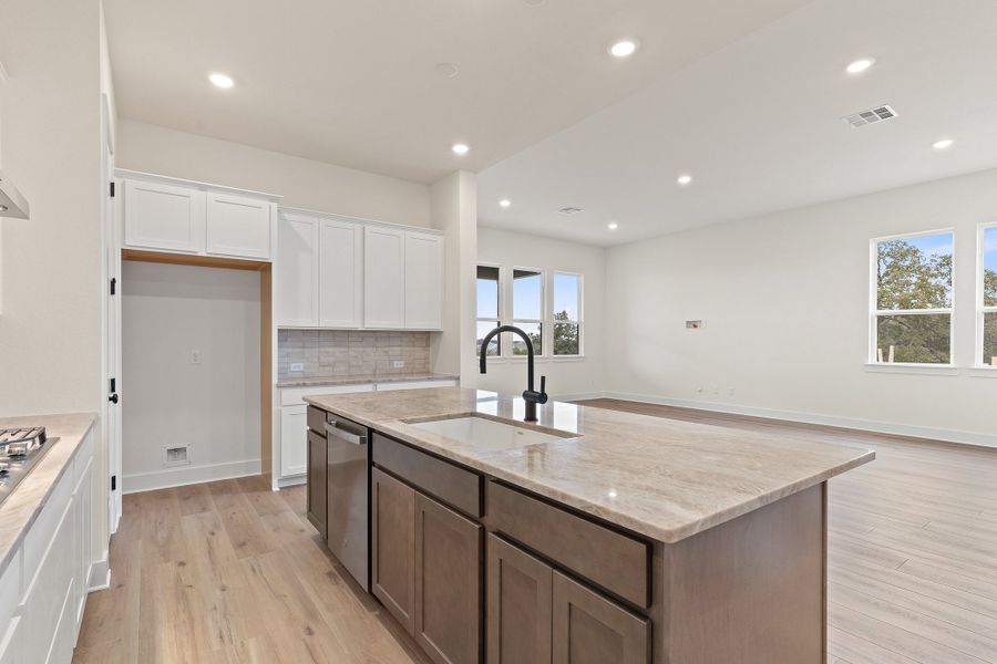 Representative furnished interior of a home built from the Waterville by Ashton Woods in The Trails at Carmel, Pflugerville (Image 9).
