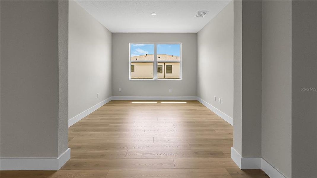 Spacious, unfurnished interior of a new home in Woodland Preserve, Parrish (Image 15).