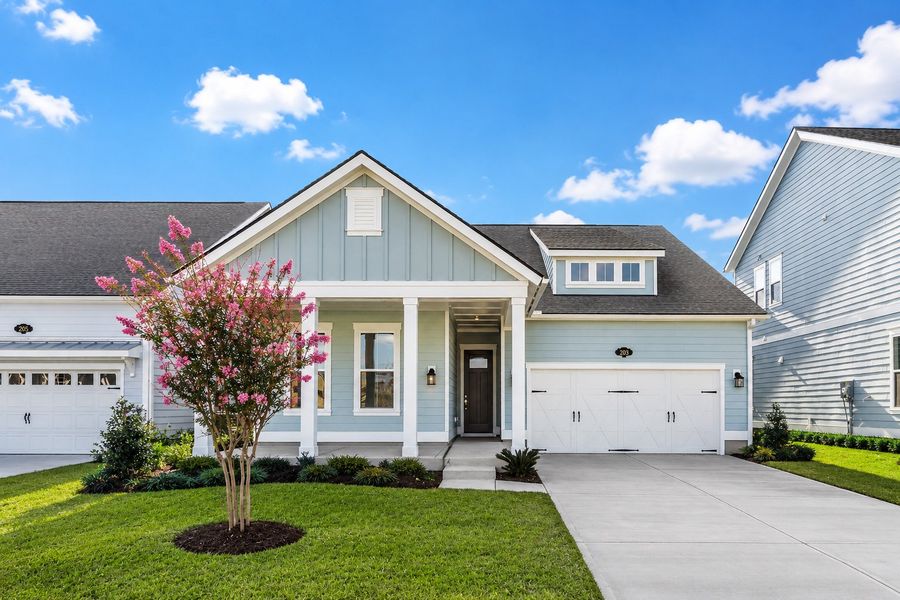 Front exterior of a new home in Beach View at Grande Dunes, Myrtle Beach, SC, highlighting curb appeal (Image 1). Front exterior of a new home in Beach View at Grande Dunes, Myrtle Beach, SC, highlighting curb appeal (Image 1).