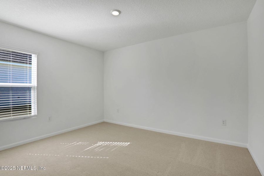 Spacious, unfurnished interior of a new home in Cordova Palms, St. Augustine (Image 15).