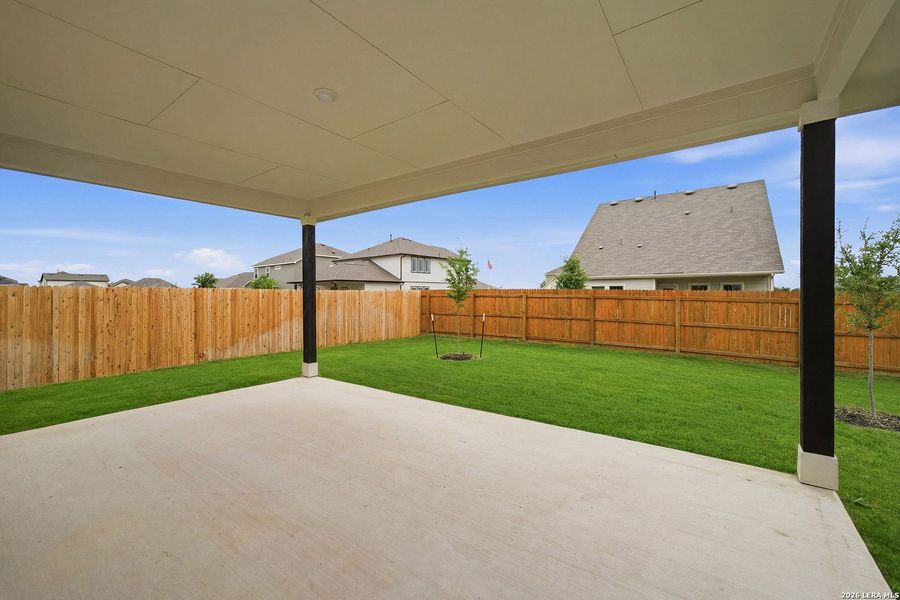 Exterior details and patio area of a home in Hennersby Hollow, San Antonio (Image 4).