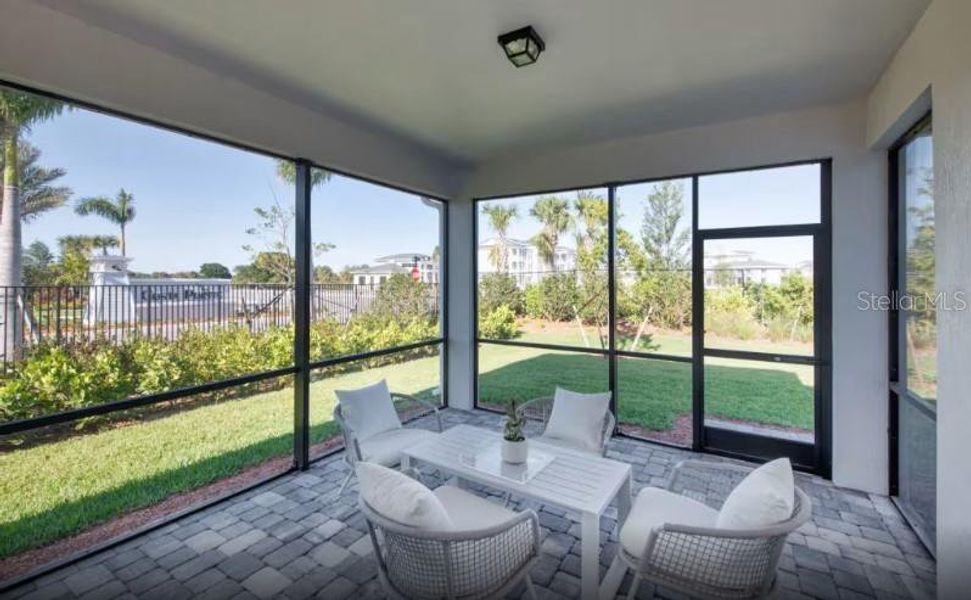 Exterior details and patio area of a home in Shores at Stillwater, Englewood (Image 2). Exterior details and patio area of a home in Shores at Stillwater, Englewood (Image 2).