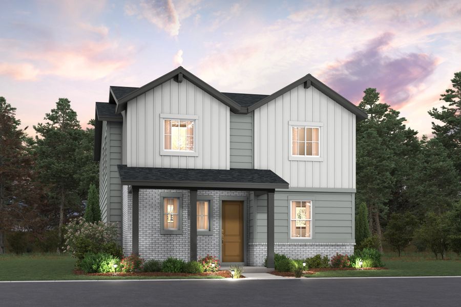 A grey house with trees in the background.