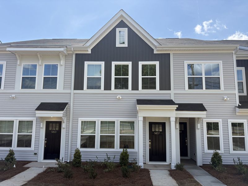 Front exterior of a new home in Sloan Station, Charlotte, NC, highlighting curb appeal (Image 1). Front exterior of a new home in Sloan Station, Charlotte, NC, highlighting curb appeal (Image 1).