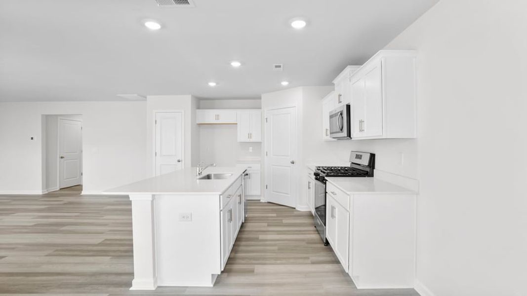 Furnished interior view inside a new home in Village Grove, Greenville (Image 8).