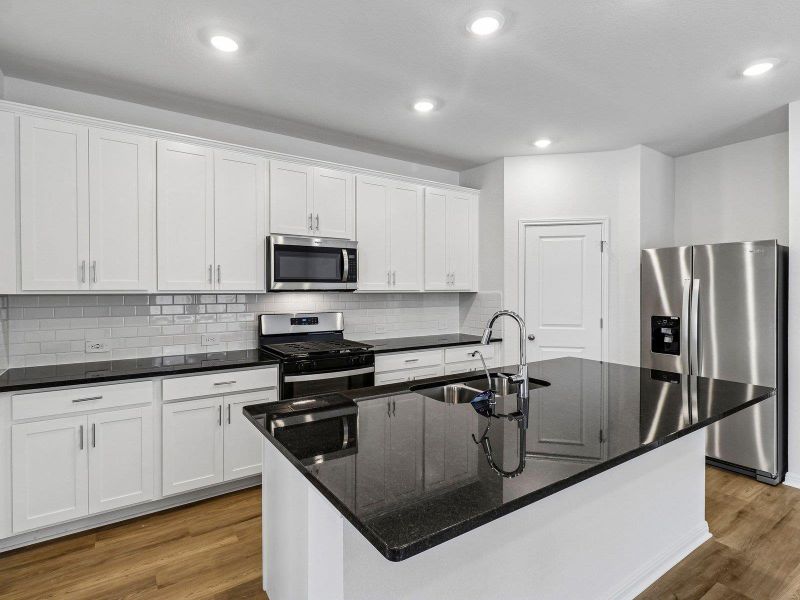 Photo is not of the actual home, but is an inspirational photo of builder’s model home and may depict options, furnishings, and/or decorator features that are not included Photo is not of the actual home, but is an inspirational photo of builder’s model home and may depict options, furnishings, and/or decorator features that are not included