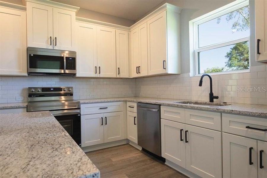 Furnished interior view inside a new home in , Ocala (Image 7).