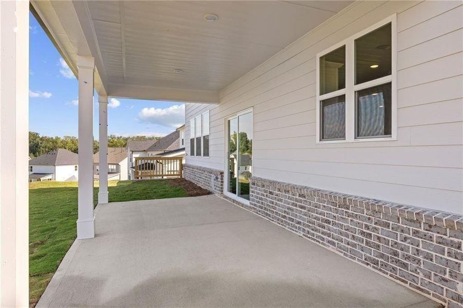 Exterior details and patio area of a home in The Estates at Gainesville Township, Gainesville (Image 29).