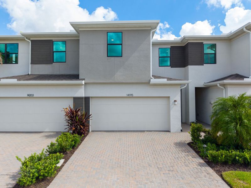 Representative exterior photo of a completed home built from the Ashton by Mattamy Homes in Tradition, Port St. Lucie, FL (Image 2).