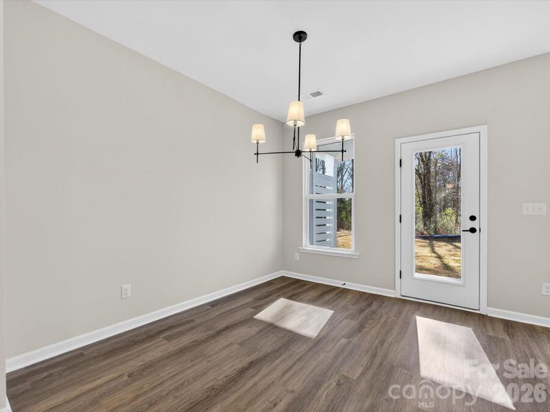 Light & bright dining area with LVP flooring