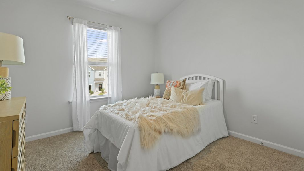 Representative furnished interior of a home built from the DUNCAN by D.R. Horton in Carolina Groves Townhomes, Moncks Corner (Image 18).