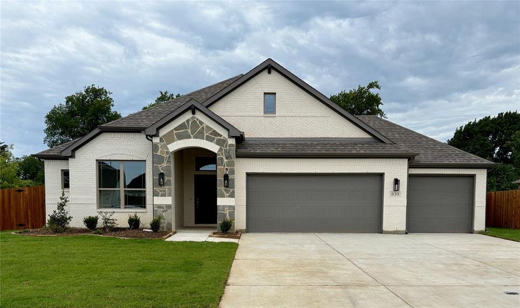 Front exterior of a new home in , Tioga, TX, highlighting curb appeal (Image 1). Front exterior of a new home in , Tioga, TX, highlighting curb appeal (Image 1).