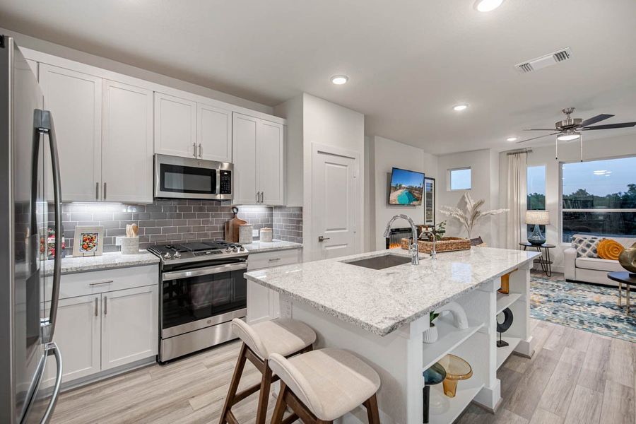 Furnished interior view inside a new home in Centero at Stone Oak, San Antonio (Image 8). Furnished interior view inside a new home in Centero at Stone Oak, San Antonio (Image 8).