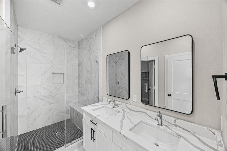 Primary Bathroom with tile shower