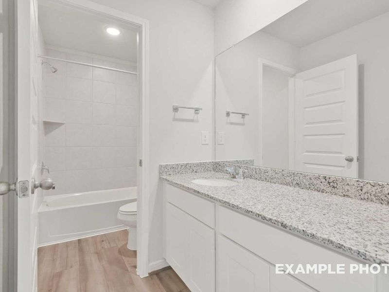 Furnished interior view inside a new home in Caney Creek Place, Conroe (Image 12).
