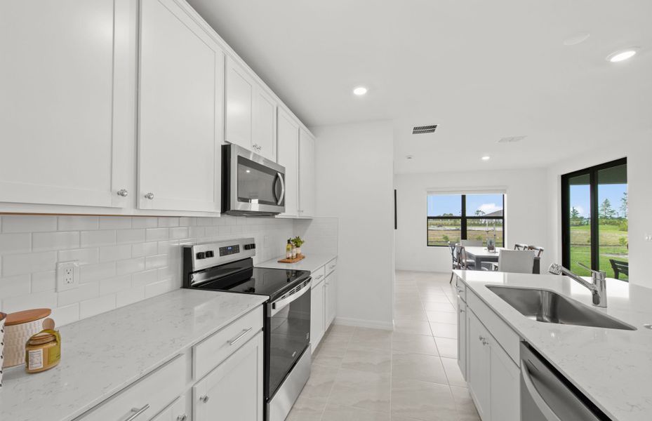 Furnished interior view inside a new home in Whispering Lakes, Lehigh Acres (Image 7).
