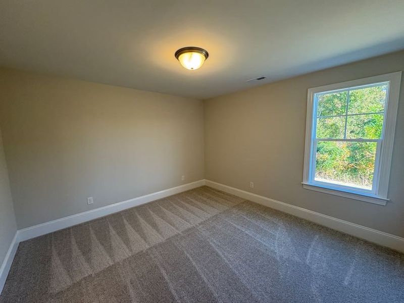Spacious, unfurnished interior of a new home in Riverside Cove, Wilmington (Image 32).