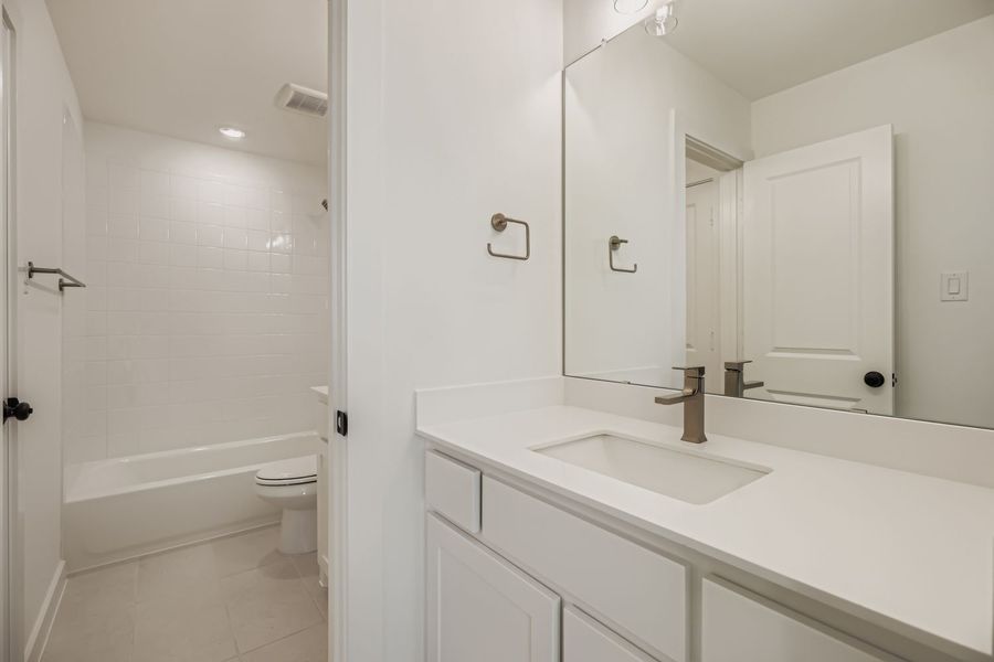 Furnished interior view inside a new home in Castle Hills Northpointe - Townhomes, Carrollton (Image 11). Furnished interior view inside a new home in Castle Hills Northpointe - Townhomes, Carrollton (Image 11).