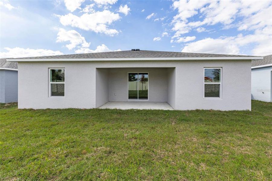 Exterior details and patio area of a home in The Grove at Scenic Terrace, Lake Hamilton (Image 9).