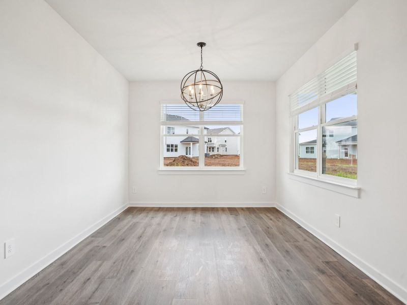 The open-concept floorplan allows for an easy flow between the kitchen and dining areas. The open-concept floorplan allows for an easy flow between the kitchen and dining areas.
