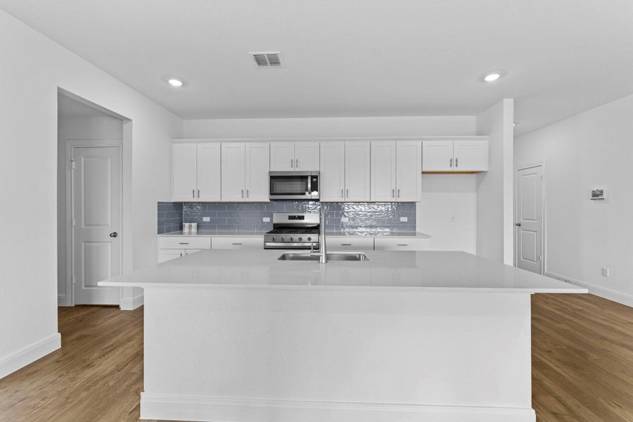 Furnished interior view inside a new home in Railhead, Cedar Creek (Image 8).
