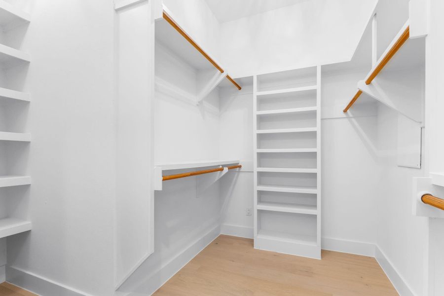 Spacious closet with custom shelving added Spacious closet with custom shelving added