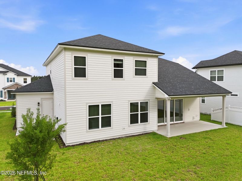 Exterior details and patio area of a home in Silver Landing At Silverleaf, St. Augustine (Image 33).