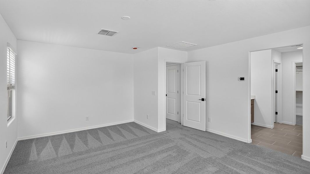 Spacious, unfurnished interior of a new home in Artisan at Asante, Surprise (Image 20).