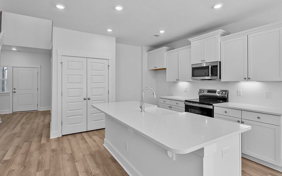 Furnished interior view inside a new home in Fieldstone, Lexington (Image 7).